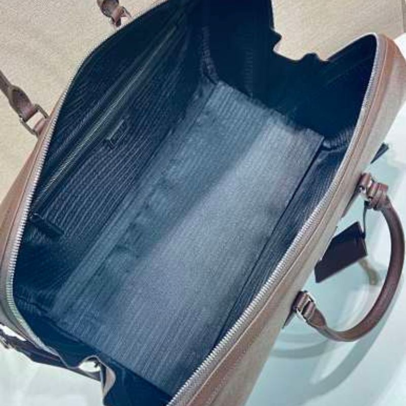 Prada Saffiano Leather Travel Bag in a rich cocoa brown.