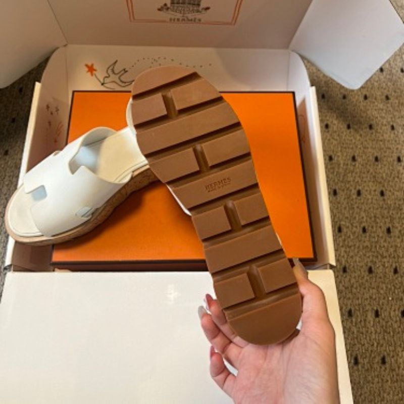 Hermès Eze Sandals in white calfskin.