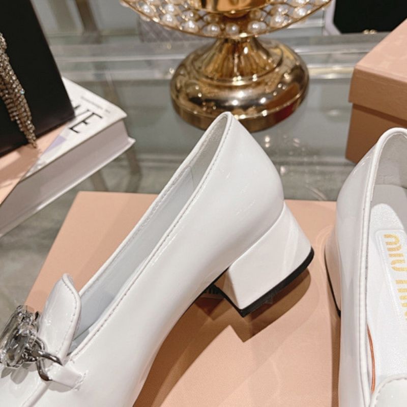 Miu Miu Embellished Patent Leather Pumps