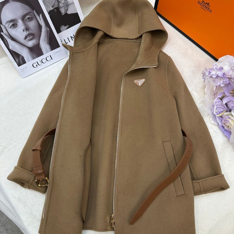 Prada hooded coat with a belt.