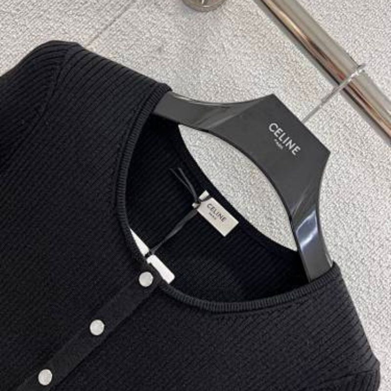 Celine cropped long-sleeved cardigan with metallic buttons.