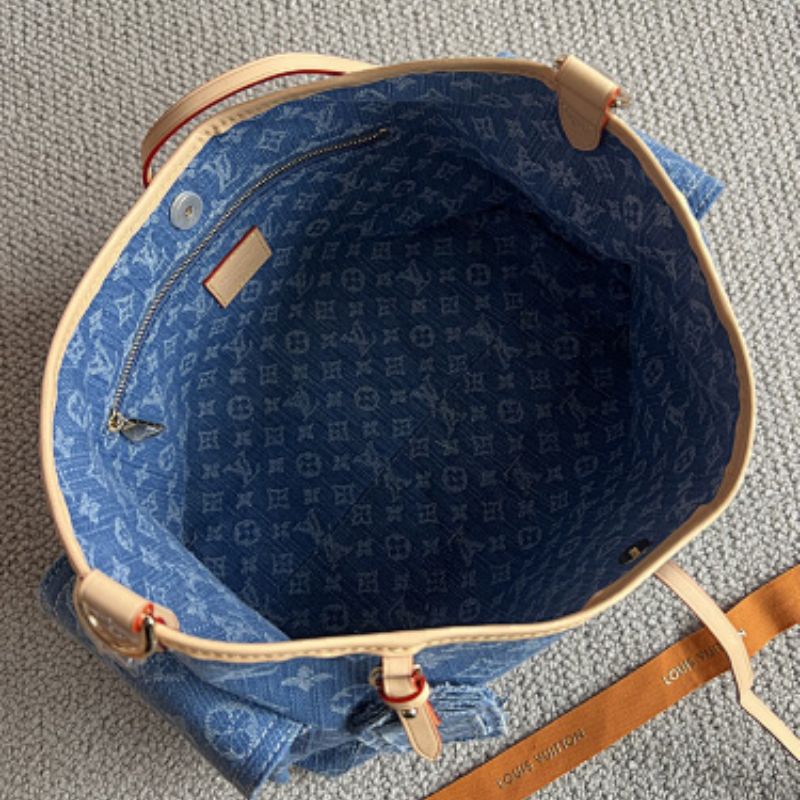 Louis Vuitton's Monogram Carryall Cargo PM Louis Vuitton's Monogram Denim collection.