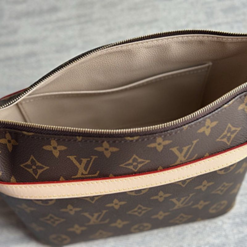 Louis Vuitton Cruiser Toiletry Bag in Monogram coated canvas.