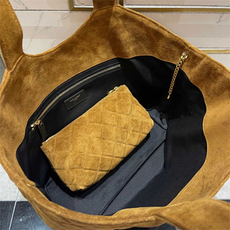 Saint Laurent the Icare Baby in quilted suede bag.