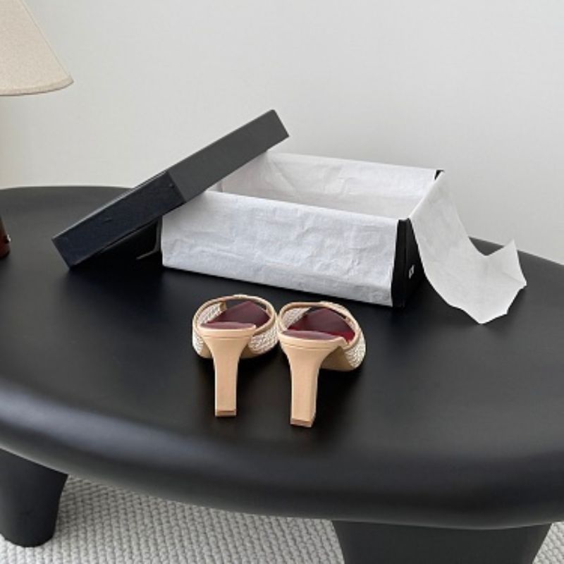 Chanel Mesh Open-Toe Mules in beige and burgundy.
