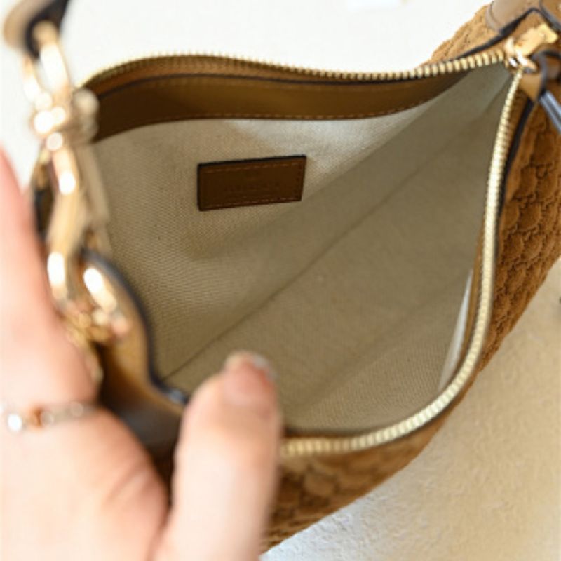 Gucci B medium shoulder bag micro GG-debossed suede with smooth calf leather trim.