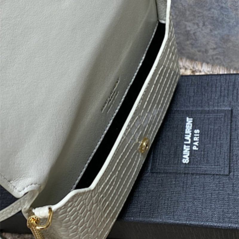 Saint Laurent Cassandre Phone Holder in Shiny Crocodile-Embossed Leather.