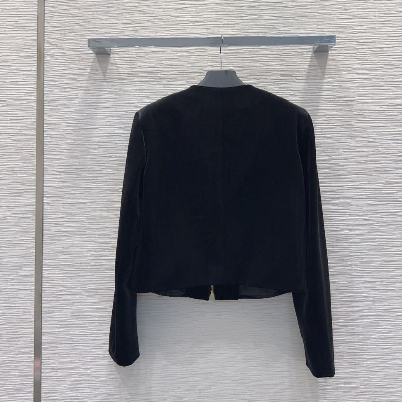 Prada velvet jacket and mini skirt set.