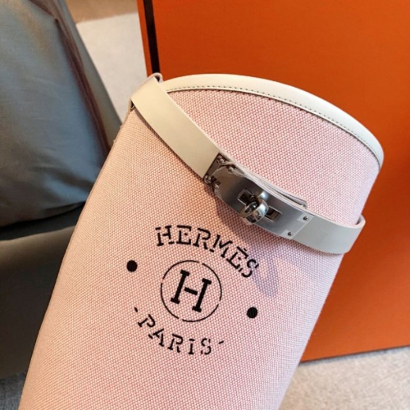 Hermès Jumping Boots in a seasonal pastel pink canvas