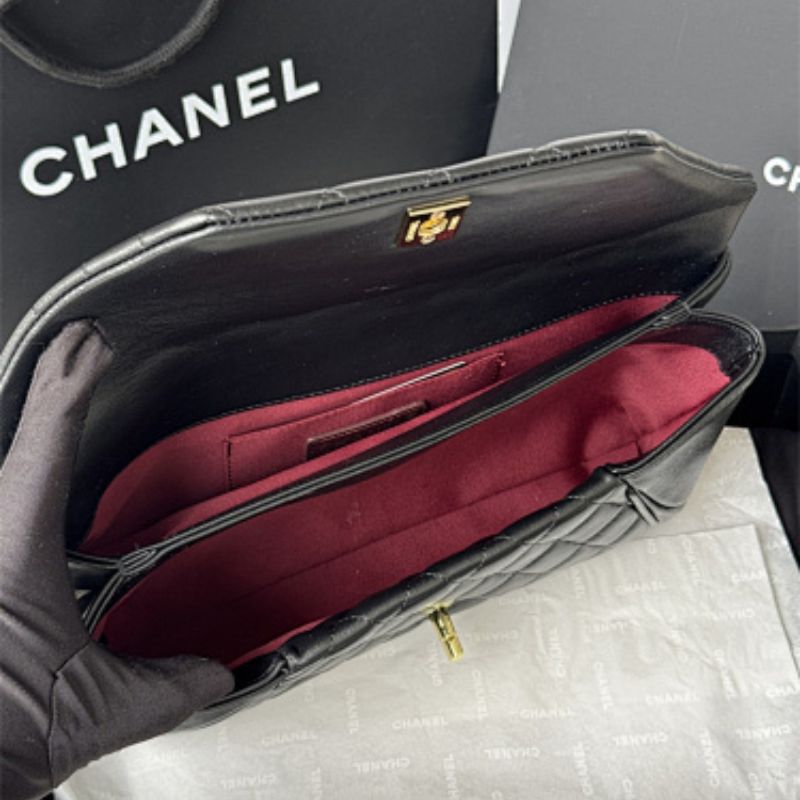 Chanel "Fold Up Again" Chevron Quilted Clutch.