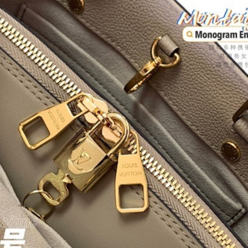 Louis Vuitton Montaigne BB in bicolor Monogram Empreinte leather.