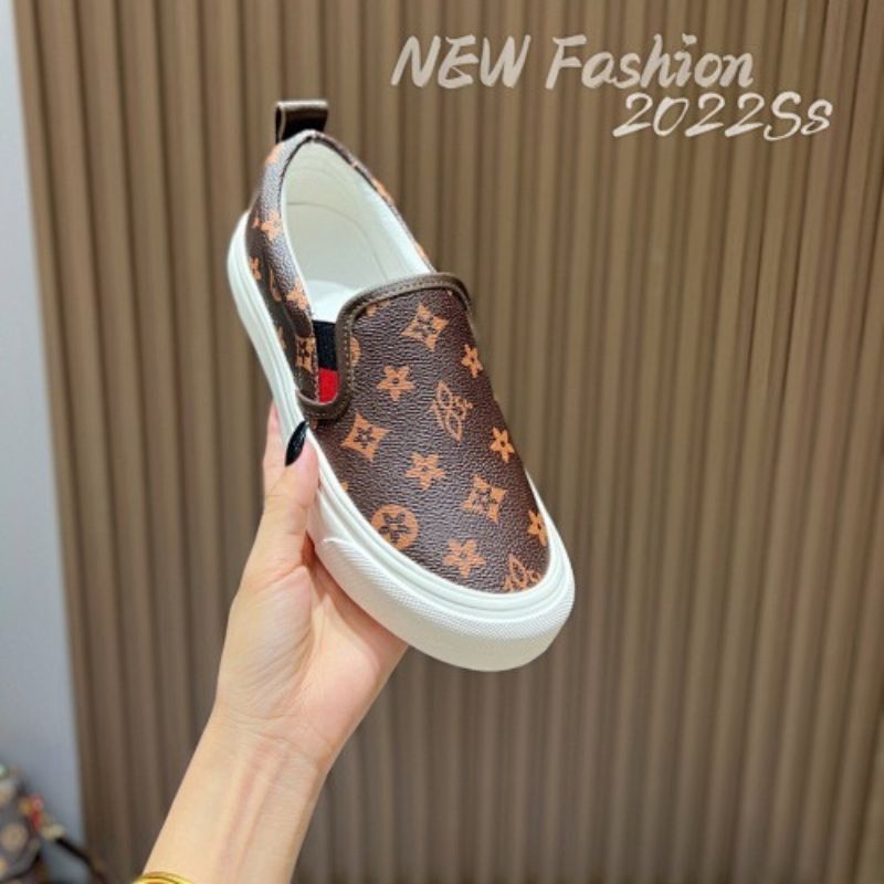 Louis Vuitton slip-on shoes in brown Monogram canvas