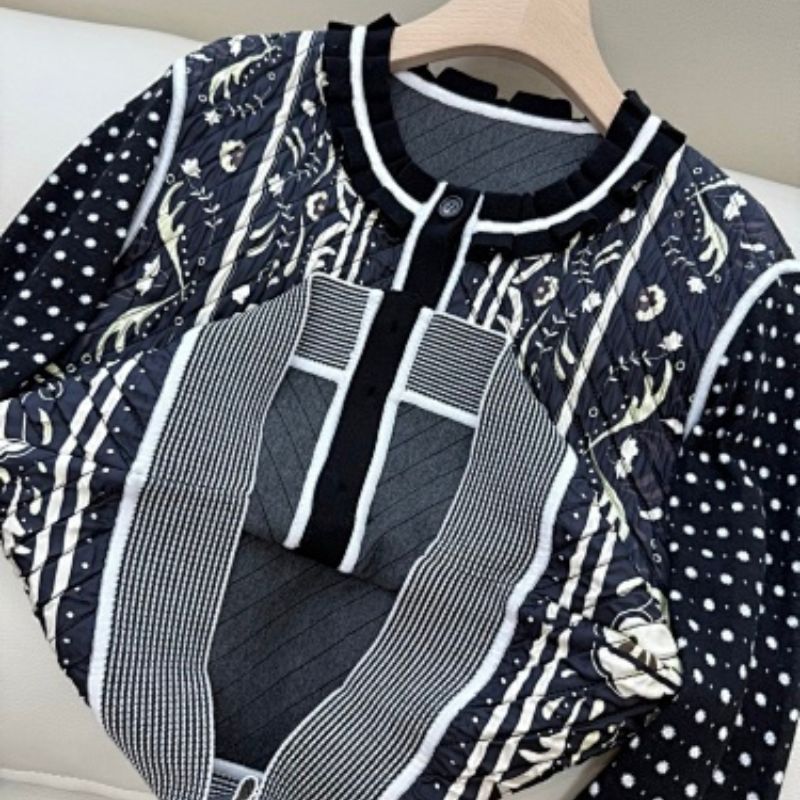 Hermès vintage-style black and white paisley knit cardigan.