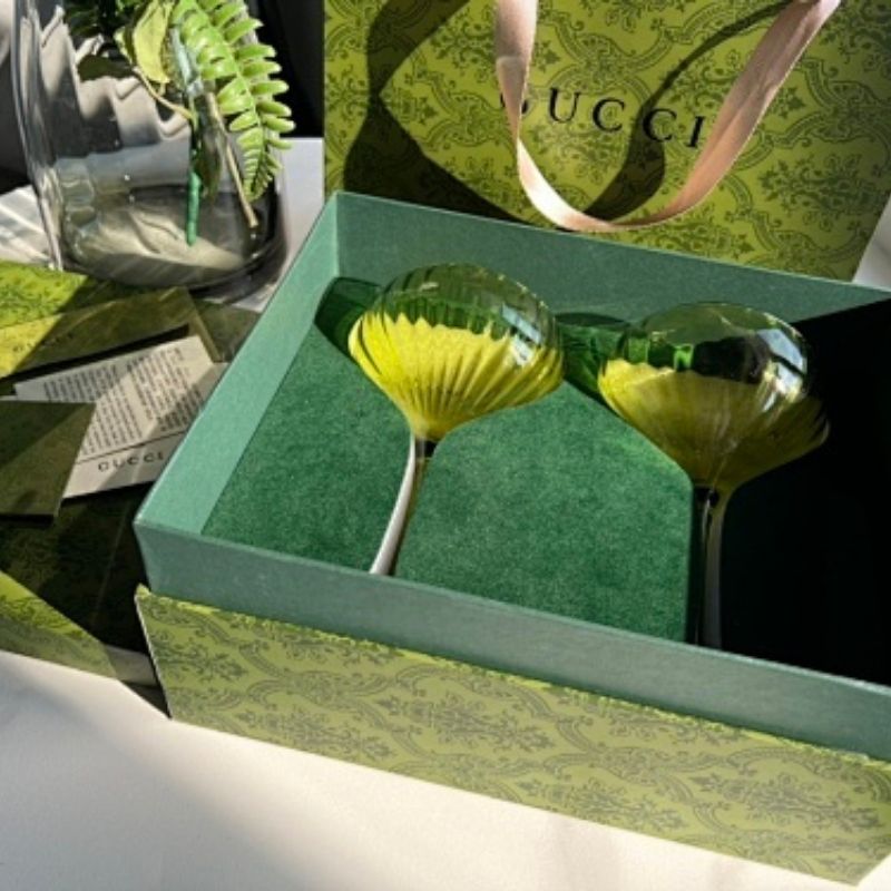 Gucci green-tinted glassware,
