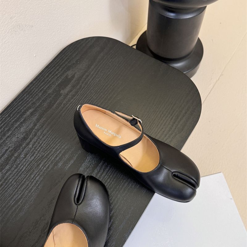 Miu Miu Tabi Mary Jane pumps.