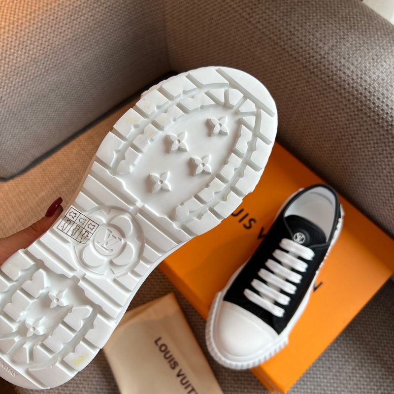 Louis Vuitton black and white version Squad sneakers.
