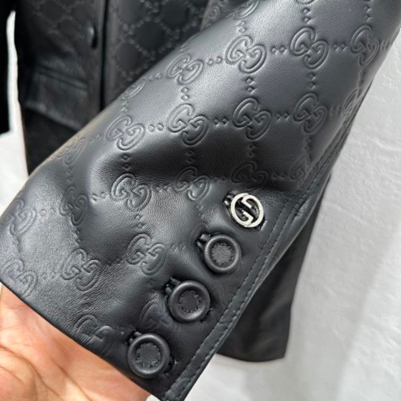 Gucci GG Embossed Leather Jacket in black.