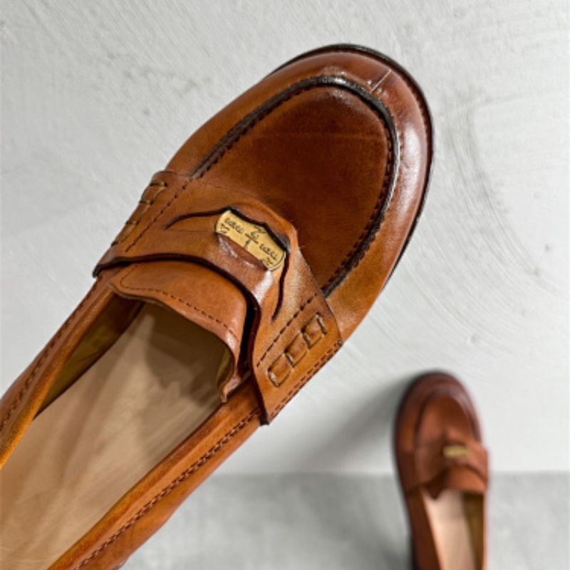 Miu miu brown leather loafers with gold-tone hardware detail,