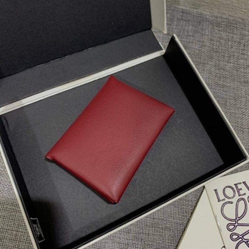 Loewe Trifold Anagram wallet in a deep red