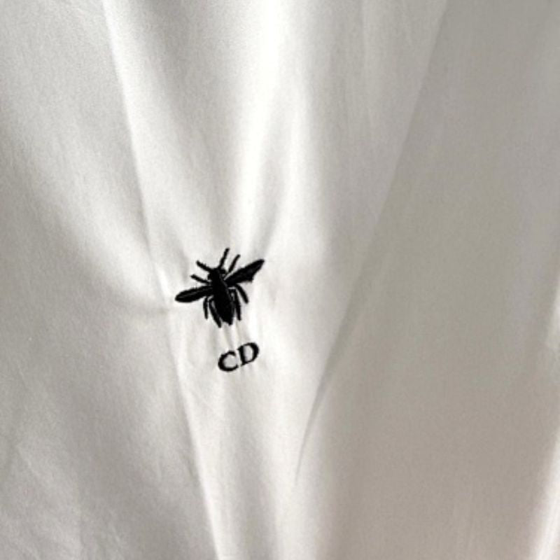 Christian Dior short-sleeved shirt with a bee embroidery.