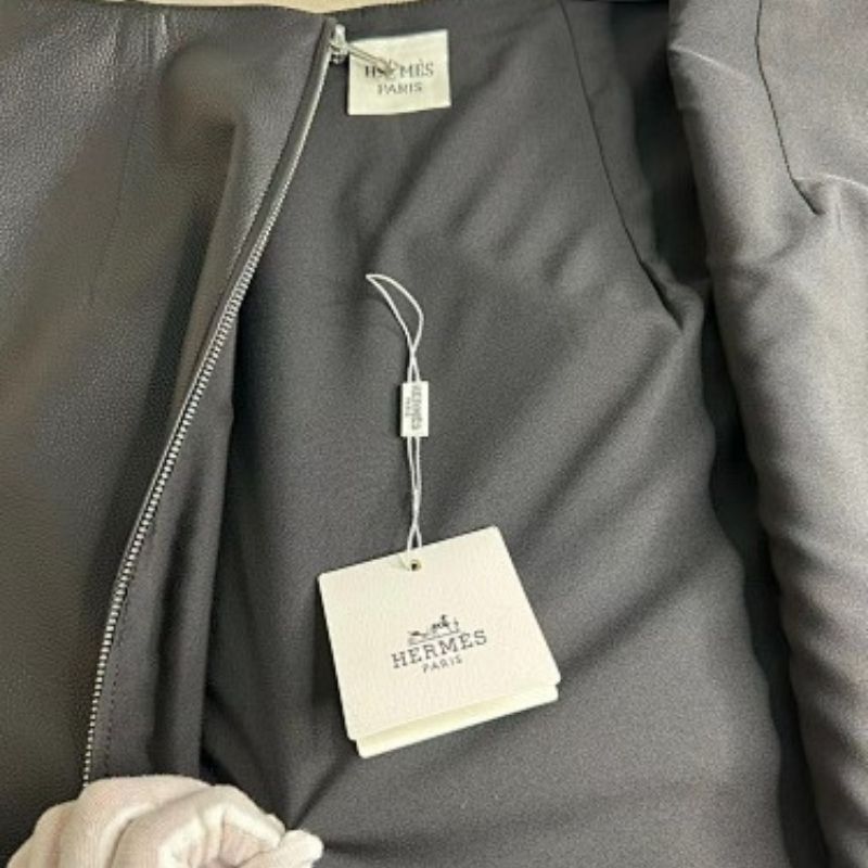 Hermès black leather midi skirt with a distinctive full-length