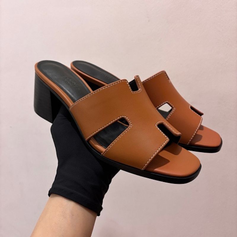Hermès Oasis Sandals, the elegant heeled counterpart to the iconic Oran flat.