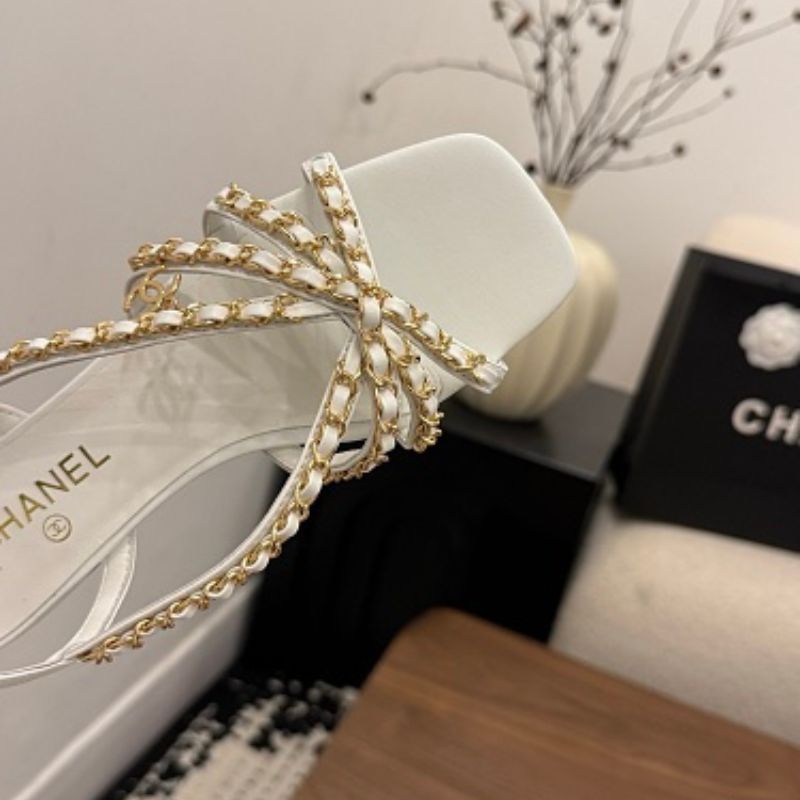 Chanel Interwoven Chain Flat Slingback Sandals in white.