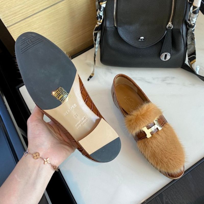 Hermès Cozette Loafers in brown alligator and mink fur.