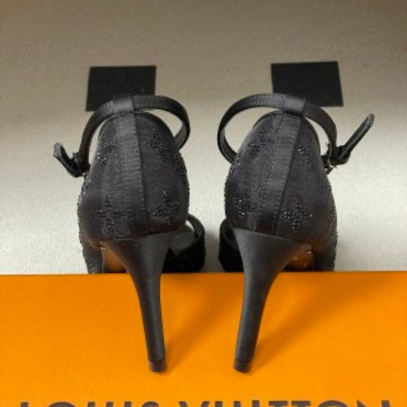 Louis Vuitton Gala Sandals in black.