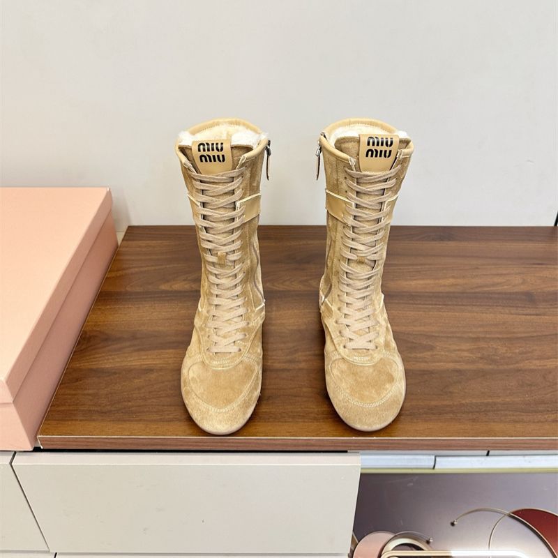 Miu Miu Gymnasium Suede and Shearling Boxer Boots.