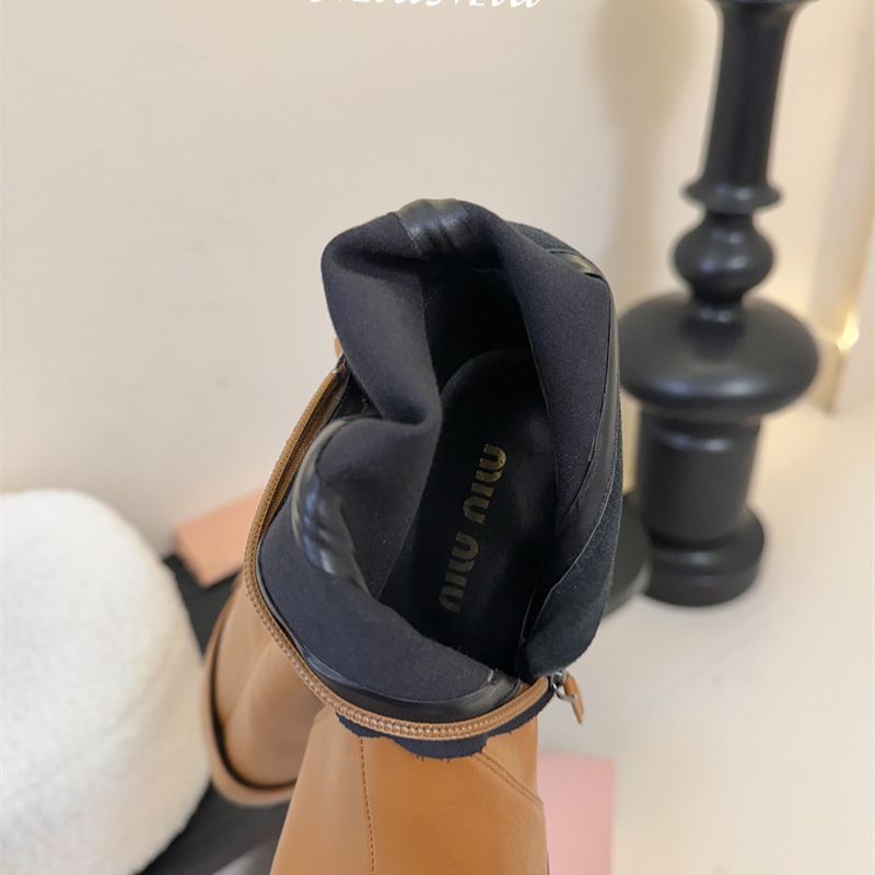 Miu Miu knee-high slip-on riding-style boots