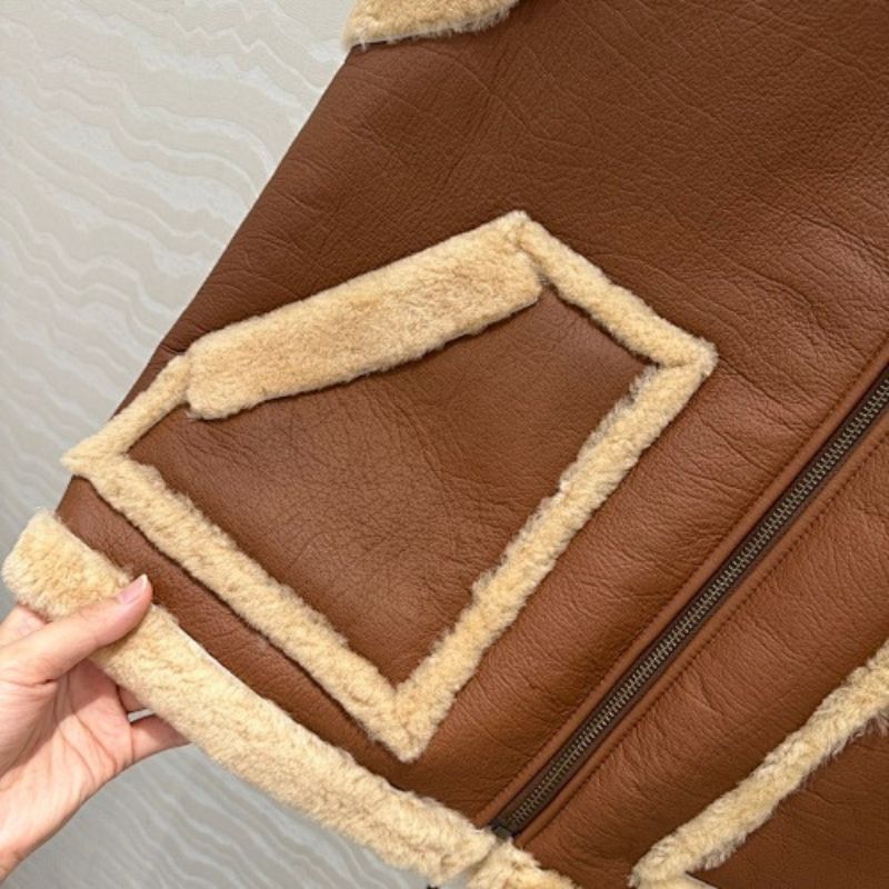 Celine Vintage-Finish Vest in Shearling.