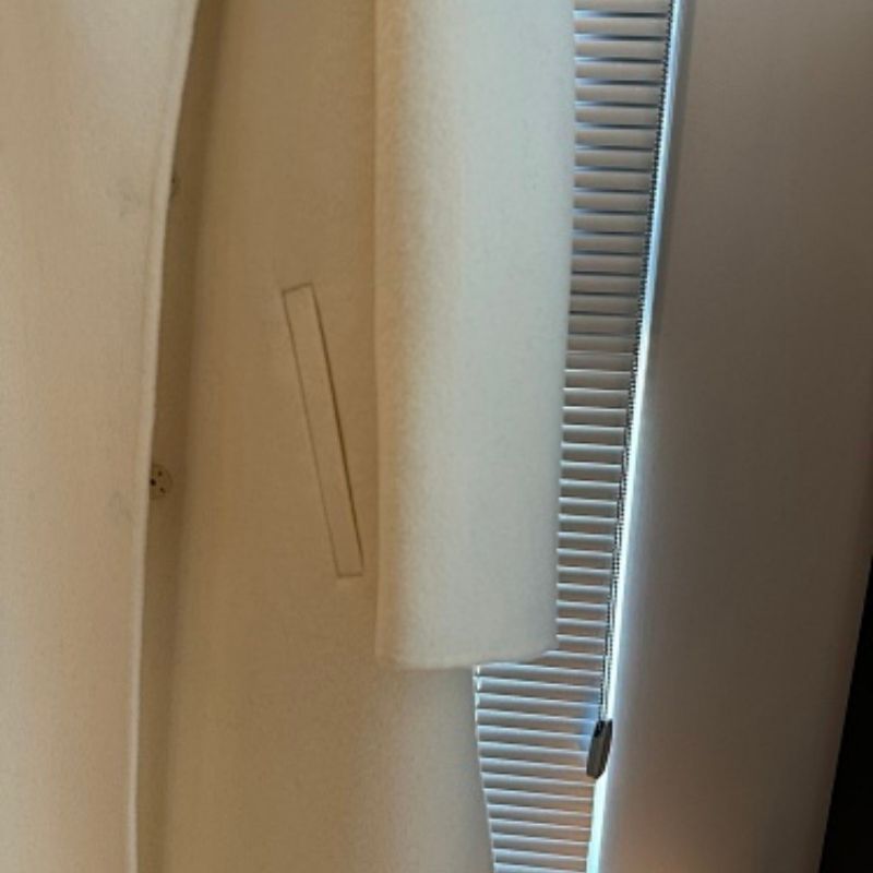 HERMES PARIS asymmetrical wrap coat with a buckle closure