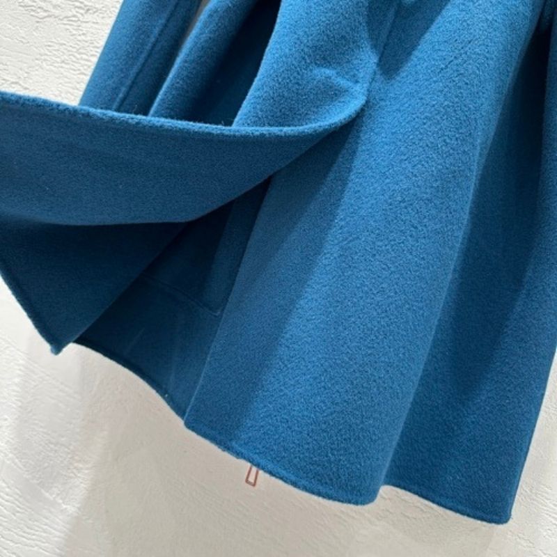 Hermès blue belted short coat,