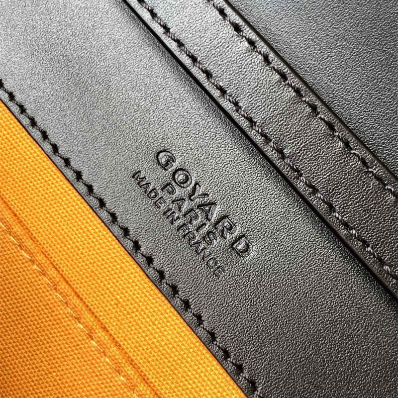 Goyard Monte-Carlo PM Clutch in the classic black