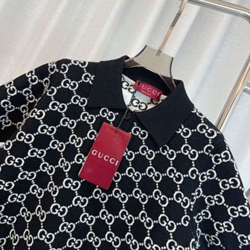 Gucci Reversible GG wool jacquard polo shirt in black and white.