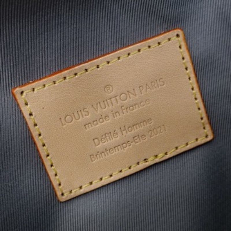 Louis Vuitton Handle Soft Trunk in Monogram Mirror coated canvas.