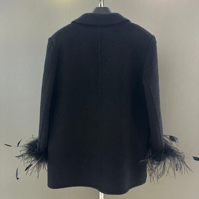 Chanel Black double-breasted blazer with feather cuffs