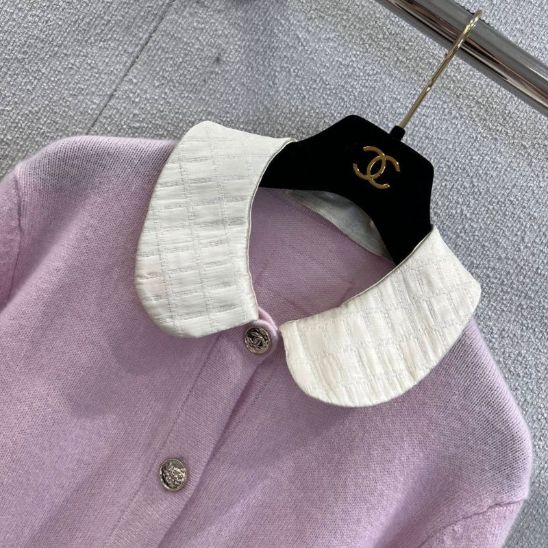 Chanel-style pink knitted cardigan with a white Peter Pan collar