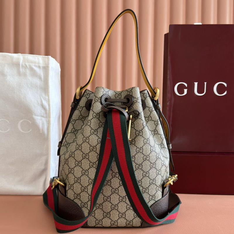 Gucci Neo Vintage GG Supreme Drawstring Bucket Backpack.