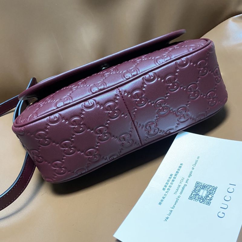 Gucci GG embossed leather Small Shoulder Bag