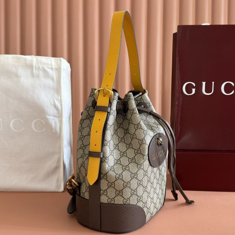 Gucci Neo Vintage GG Supreme Drawstring Bucket Backpack.