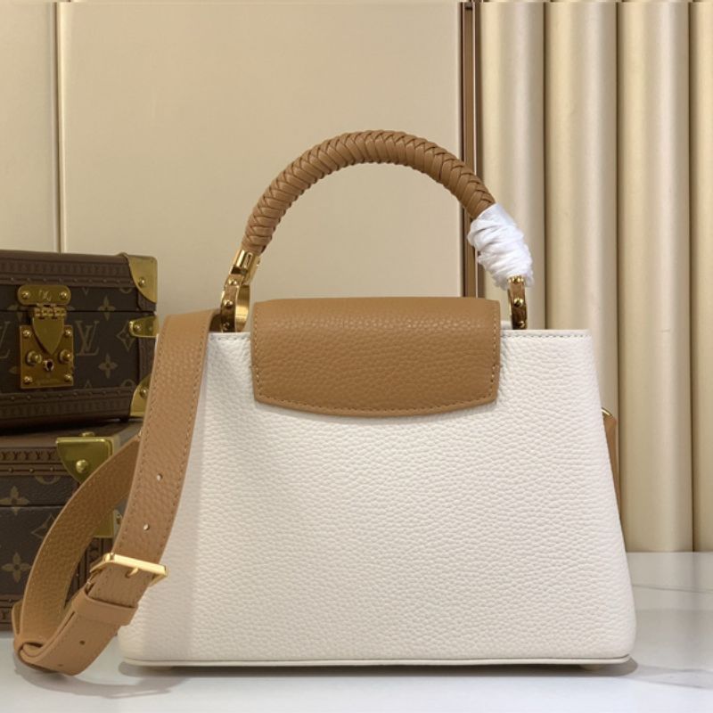 Louis Vuitton Capucines BB handbag in white Taurillon leather with a tassel charm