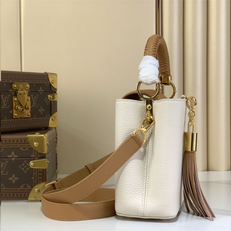 Louis Vuitton Capucines BB handbag in white Taurillon leather with a tassel charm