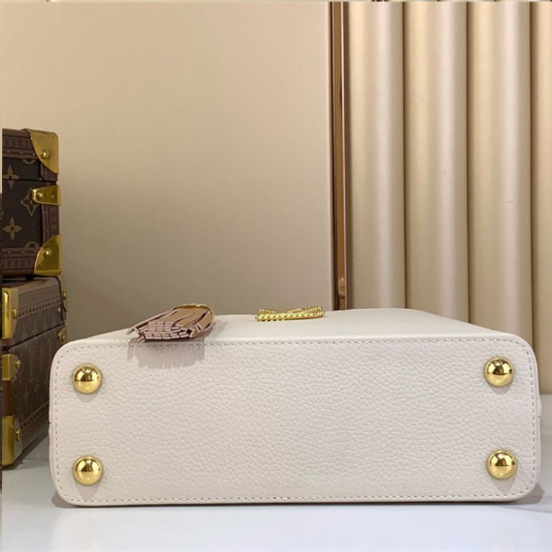 Louis Vuitton Capucines BB handbag in white Taurillon leather with a tassel charm