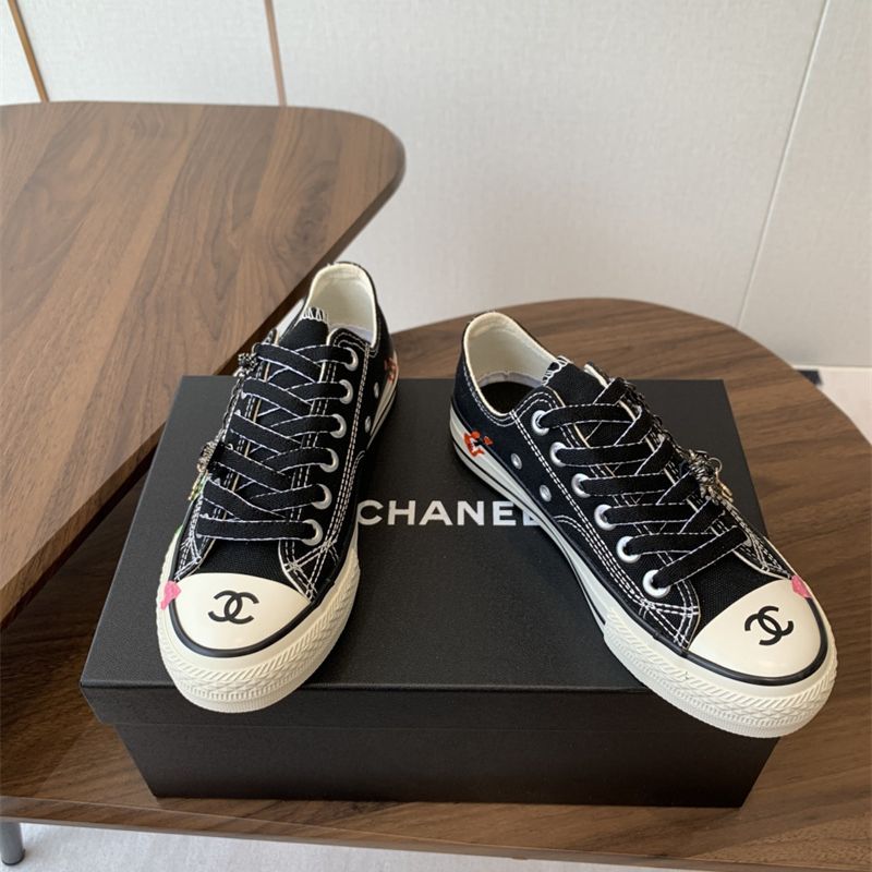 Chanel black canvas low-top sneakers