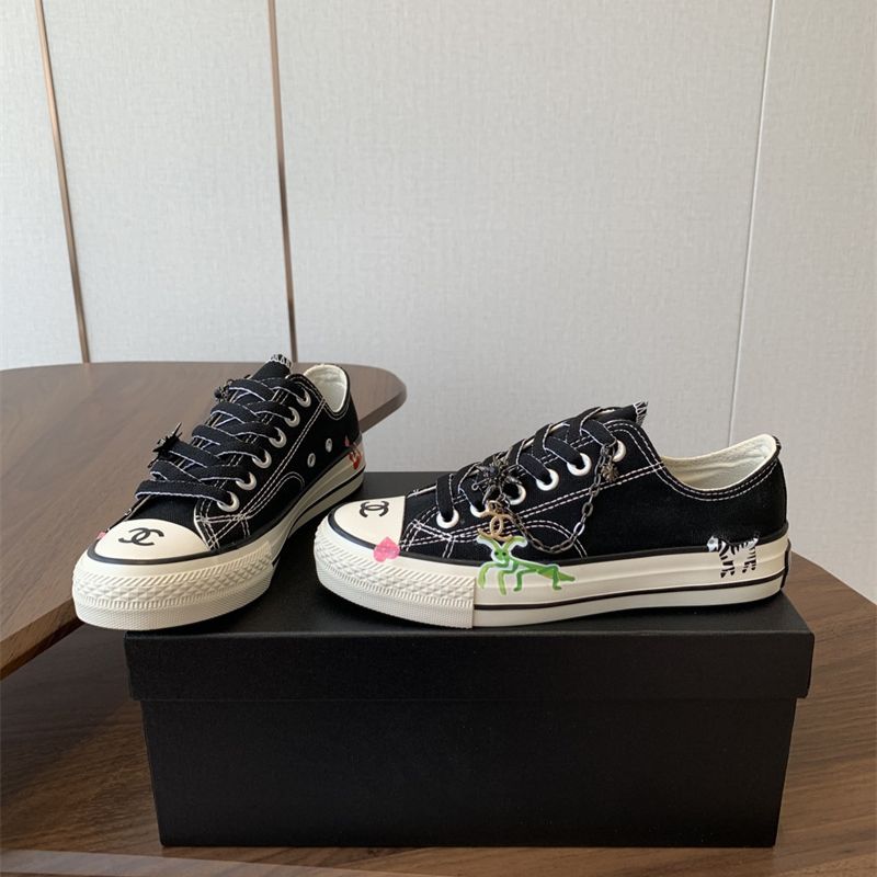Chanel black canvas low-top sneakers