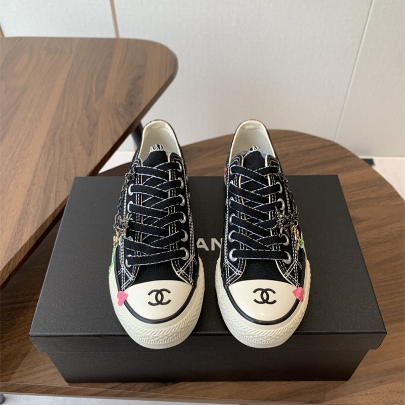 Chanel black canvas low-top sneakers