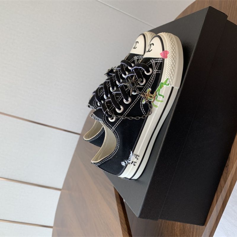 Chanel black canvas low-top sneakers