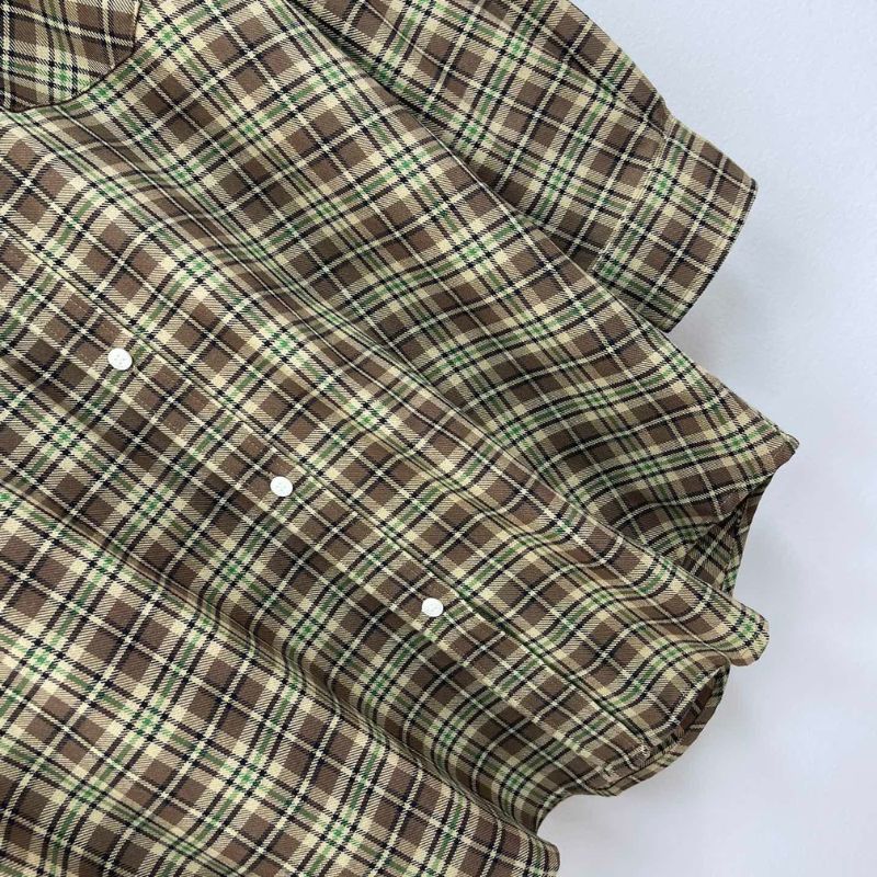 Miu Miu brown plaid shirt.